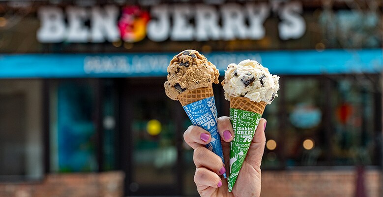hand holding 2 ice cream cones